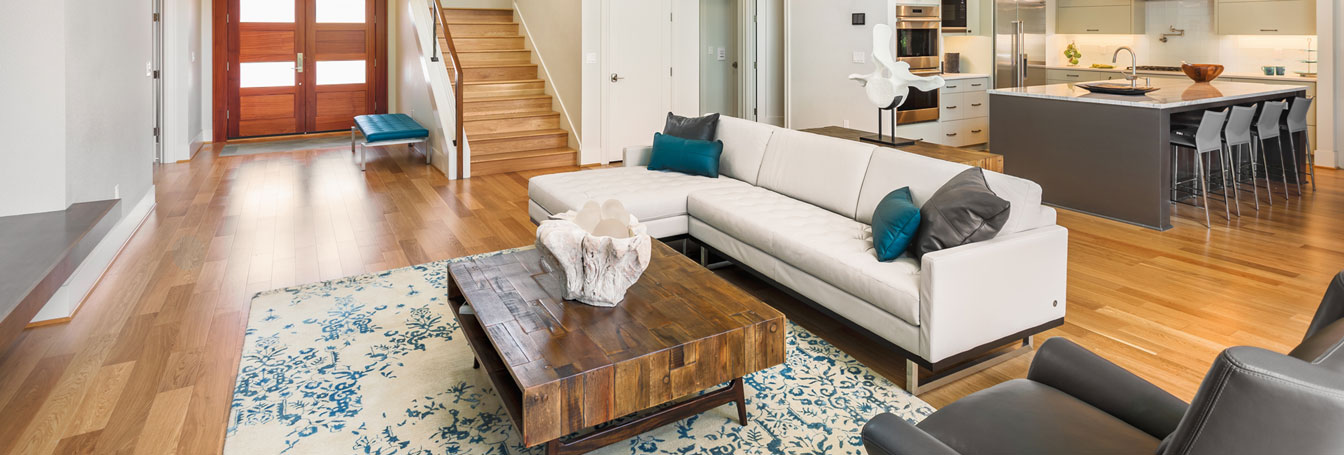 Living Room Interior in New Luxury Home With a View of the Kitchen